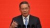 Perdana Menteri China Li Qiang menyampaikan pidatonya pada Forum Pembangunan China di Beijing pada 24 Maret 2024. (Foto: AFP)