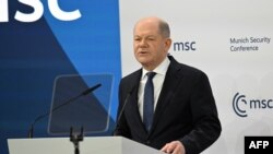German Chancellor Olaf Scholz gives a speech during the 61st Munich Security Conference (MSC) in Munich, southern Germany on February 15, 2025. (Photo by THOMAS KIENZLE / AFP)