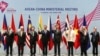 ASEAN and China foreign ministers pose for a photo ahead of the ASEAN-China Ministerial Meeting on the sidelines of the 51st ASEAN Foreign Ministers Meeting in Singapore, Aug. 2, 2018. 