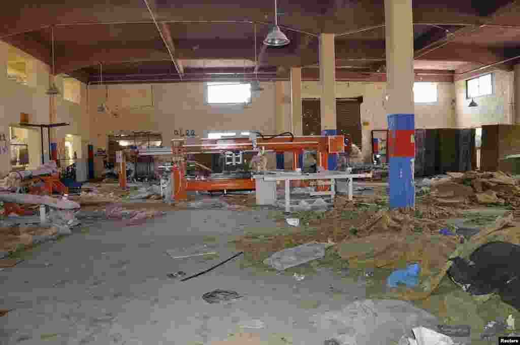 Damage at the industrial area in the al-Kaboun neighborhood in Damascus after soldiers loyal to Syria's President Bashar al-Assad took control of it from the Free Syrian Army, July 6, 2013. (SANA)