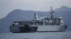 FILE - A Malaysian navy vessel patrols waters near Langkawi Island, May 16, 2015. Malaysia is buying four ships from China to help it patrol its coastline.