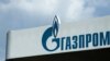 FILE - The logo of Russia's energy giant Gazprom is pictured at one of its gasoline stations in Moscow, April 16, 2021.