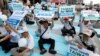 FILE - Protesters take part in a rally in Taipei against Taiwan being excluded from U.N.'s annual World Health Assembly (WHA) in Geneva, Taiwan, May 21, 2017.