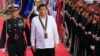Philippine President Rodrigo Duterte reviews honor guards upon his arrival during the Philippine Navy's 120th anniversary in Metro Manila, Philippines, May 22, 2018.