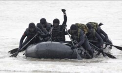 Taiwan Marines perform covert landing drills a few kilometers from mainland China near the island of Kinmen, Taiwan, Jan. 26, 2016.
